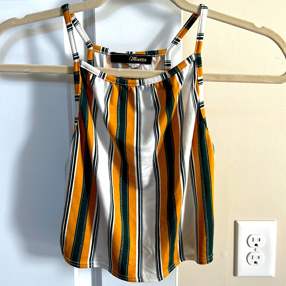 cropped tank top. Fits well and comfortable.